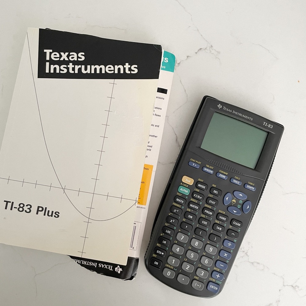 Texas Instruments TI-83 Graphing Calculator w/ Instructions Manual